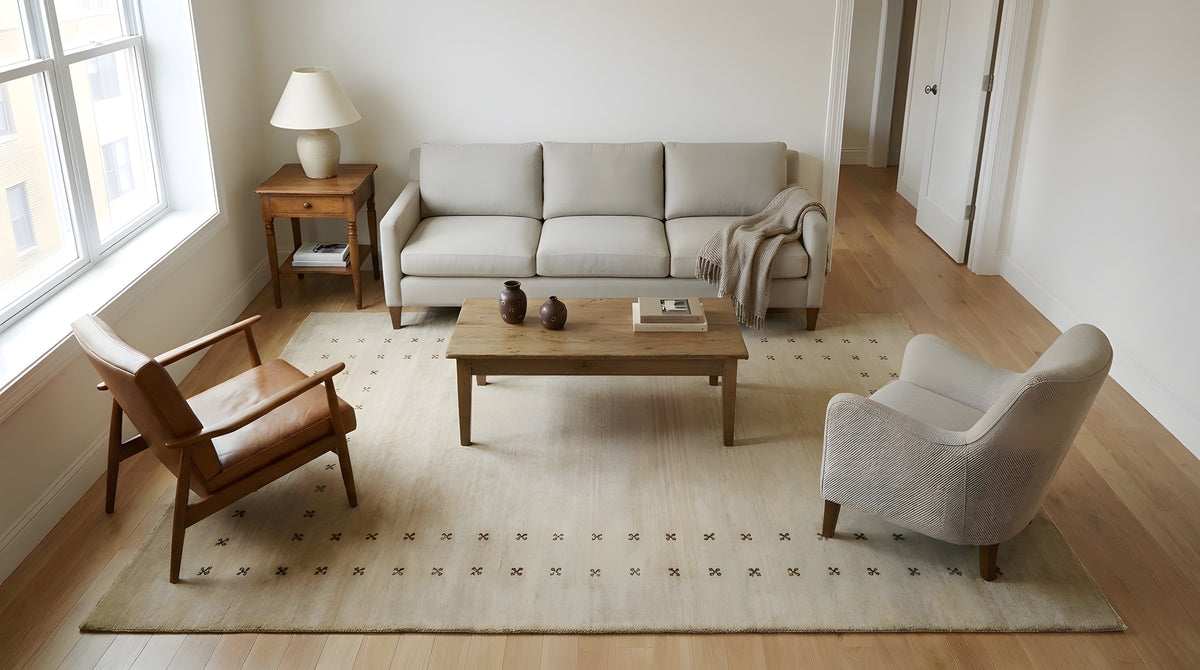 Jasmine Alluring Beige Handmade Wool Rug in a living room