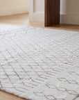 Jasmine Moroccan Ivory Hand Knotted Wool Rug in a hallway