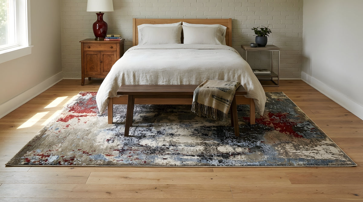 Kira Sophie Gray Hand Knotted Wool Rug in a bedroom