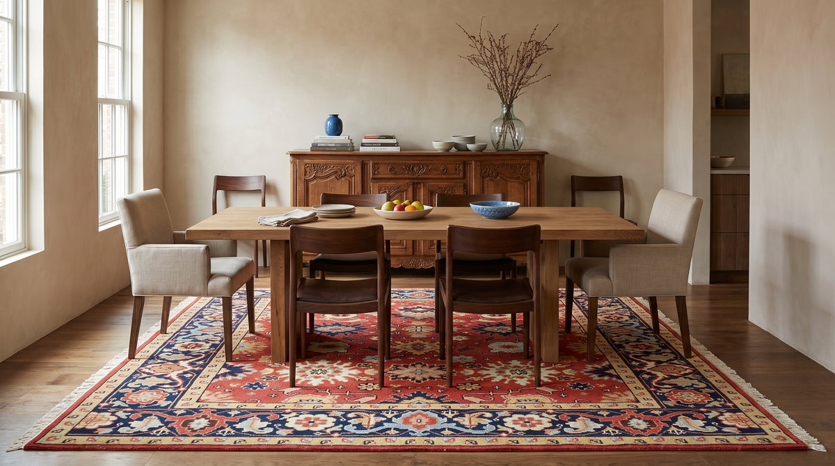 Kira Zinnia Rust Hand Knotted Wool Rug in a dining room
