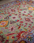 Light green Oushak rug angled full view