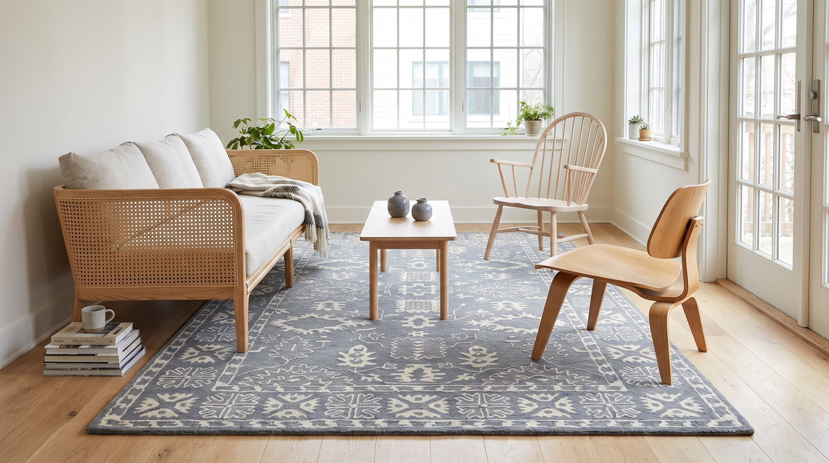 Louie Oriental Gray Hand Tufted Wool Rug in a sunroom