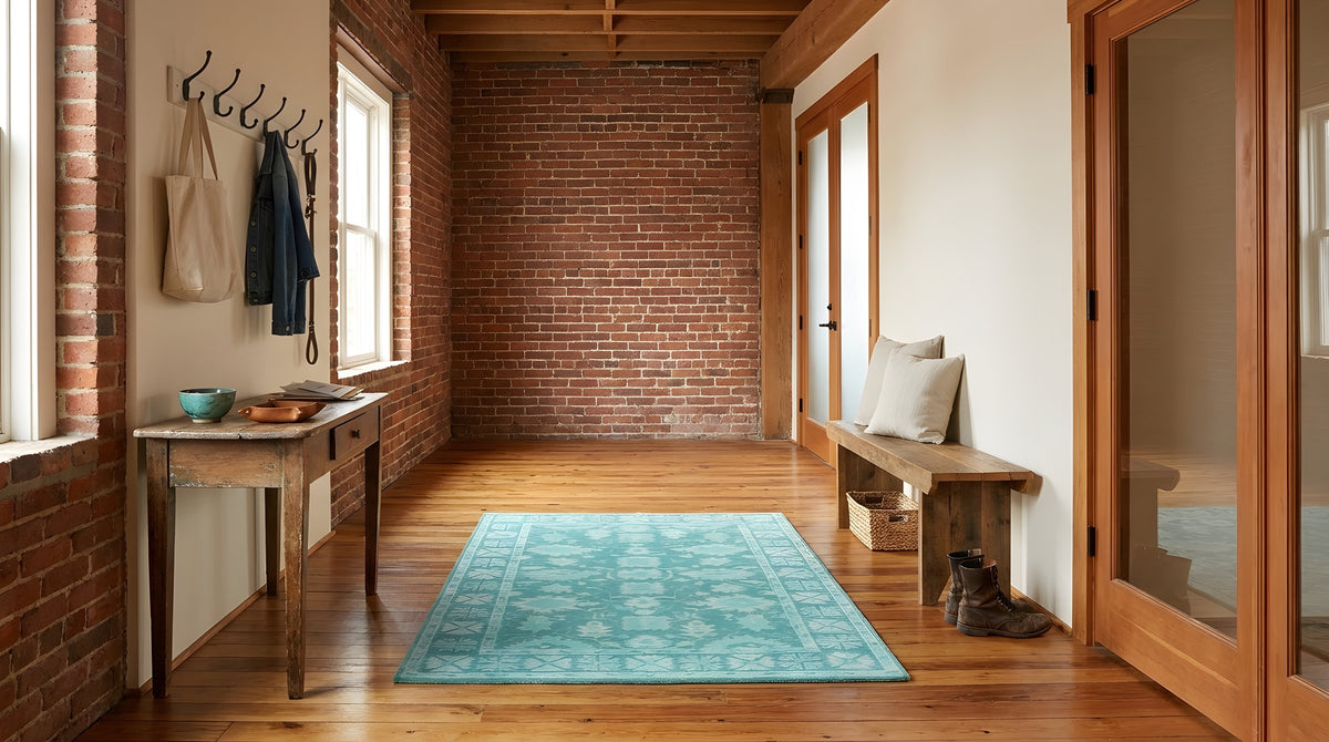 Louie Oriental Turquoise Hand Tufted Wool Rug in a entryway