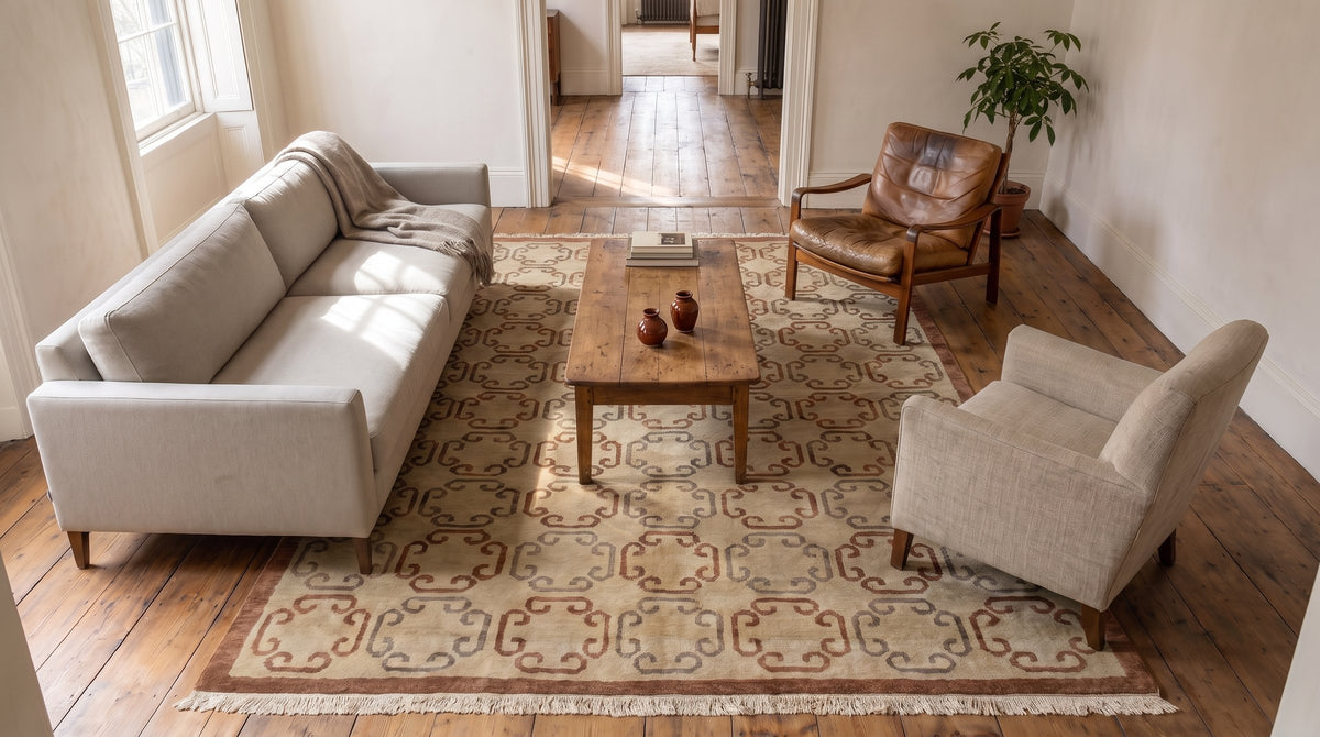 Louie Vibrant Brown and Ivory Hand Knotted Wool Rug in a living room