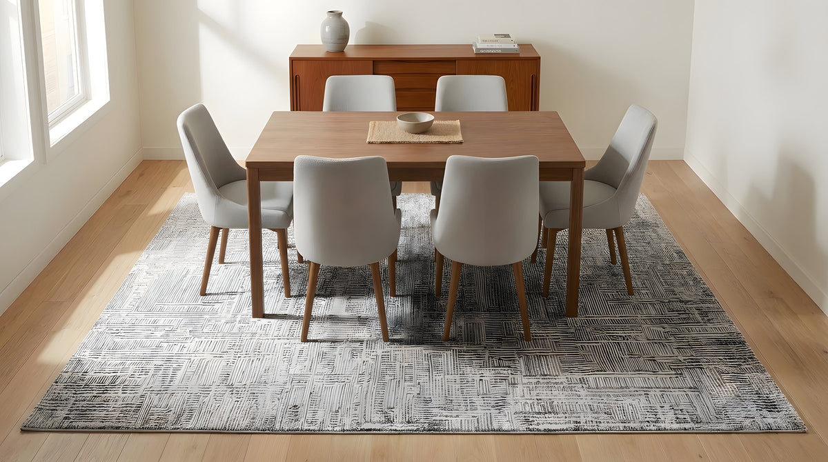 Lush Xena Ivory Handmade Wool Rug in a dining room