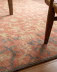 Lydia Jasmine Red Hand Knotted Wool Rug in a living room
