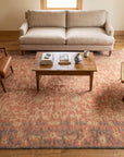 Lydia Jasmine Red Hand Knotted Wool Rug in a living room