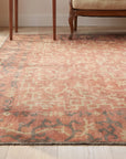 Lydia Jasmine Red Hand Knotted Wool Rug in a sunroom
