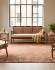 Lydia Jasmine Red Hand Knotted Wool Rug in a sunroom
