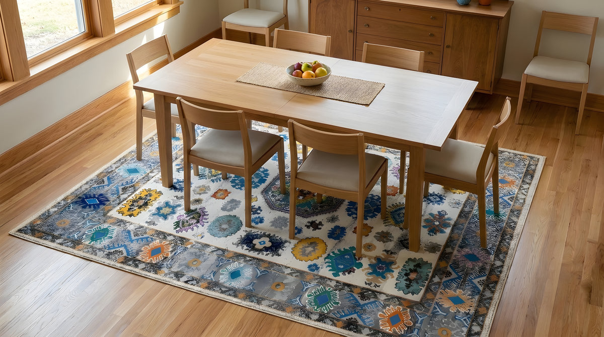 Lydia Kazak Ivory Hand Knotted Wool Rug in a dining room