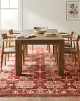 Majestic Artisan Red Hand Knotted Afghan Wool Rug in a dining room