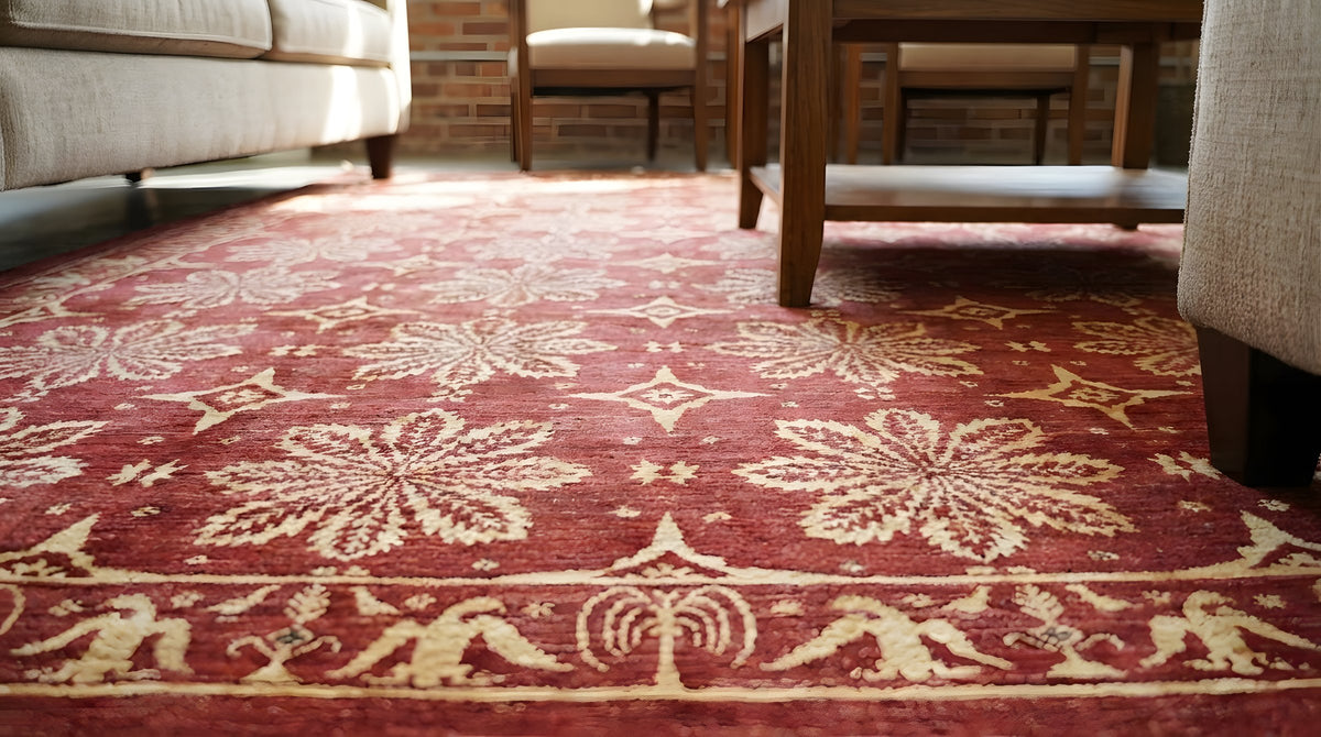 Majestic Artisan Red Hand Knotted Afghan Wool Rug in a living room