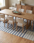 Majestic Laine Multicolor Flatweave Wool Rug in a dining room