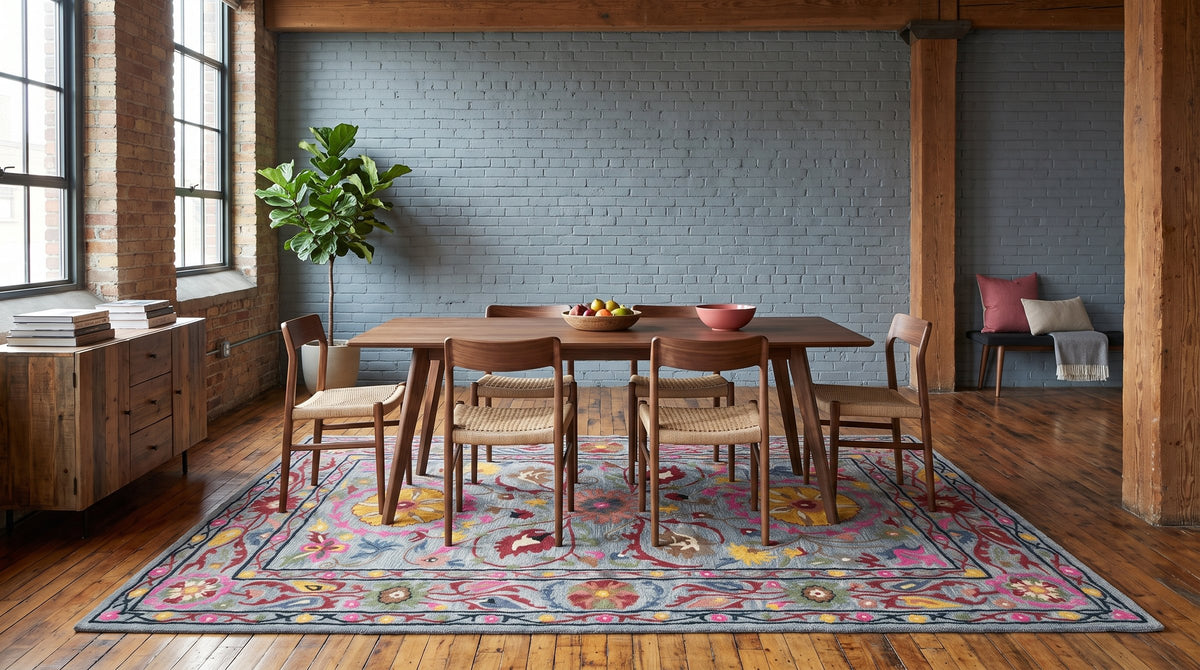 Maya Artisan Blue Hand Tufted Wool Rug in a dining room