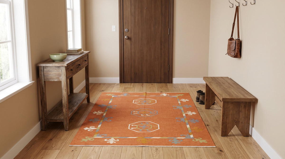 Maya Kilim Rust Flatweave Wool Rug in a entryway