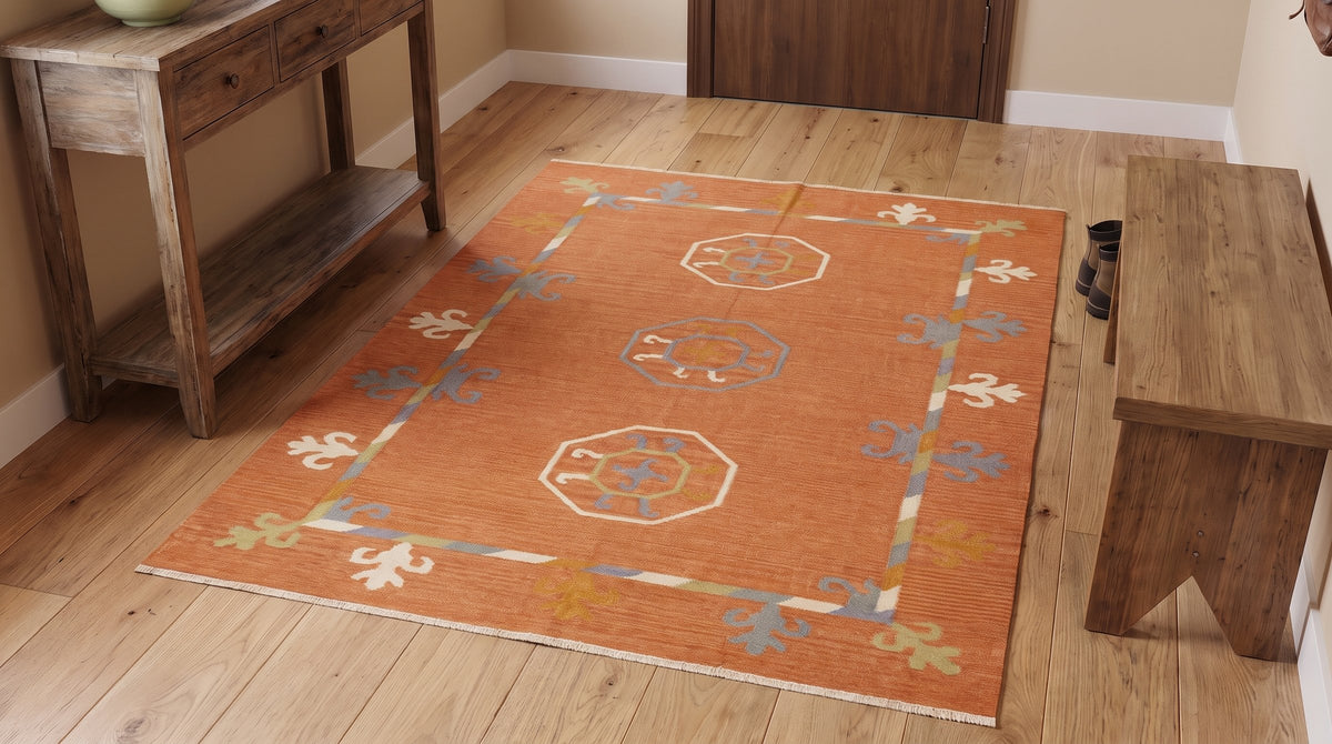 Maya Kilim Rust Flatweave Wool Rug in a entryway