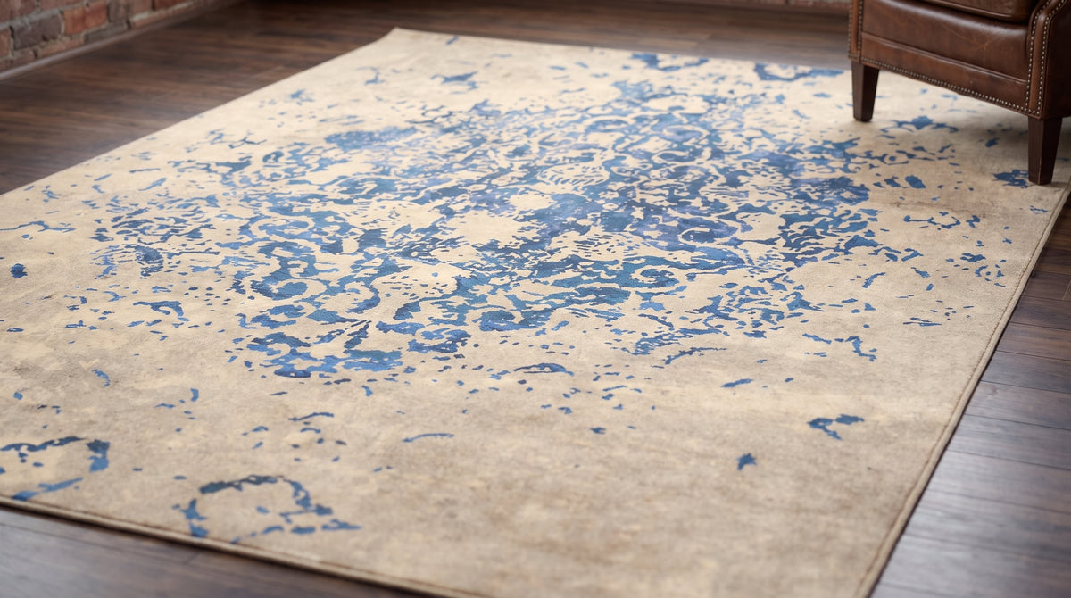 Modern Classic Blue Machine Made Rug in a home office