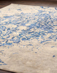 Modern Classic Blue Machine Made Rug in a home office