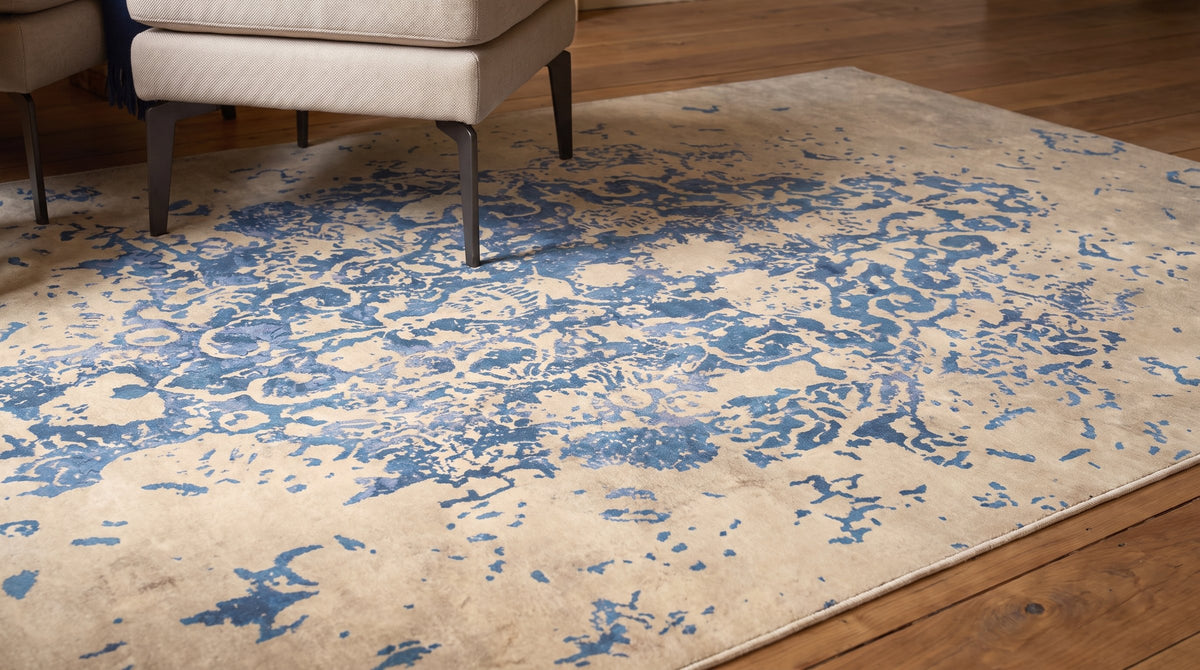 Modern Classic Blue Machine Made Rug in a reading nook
