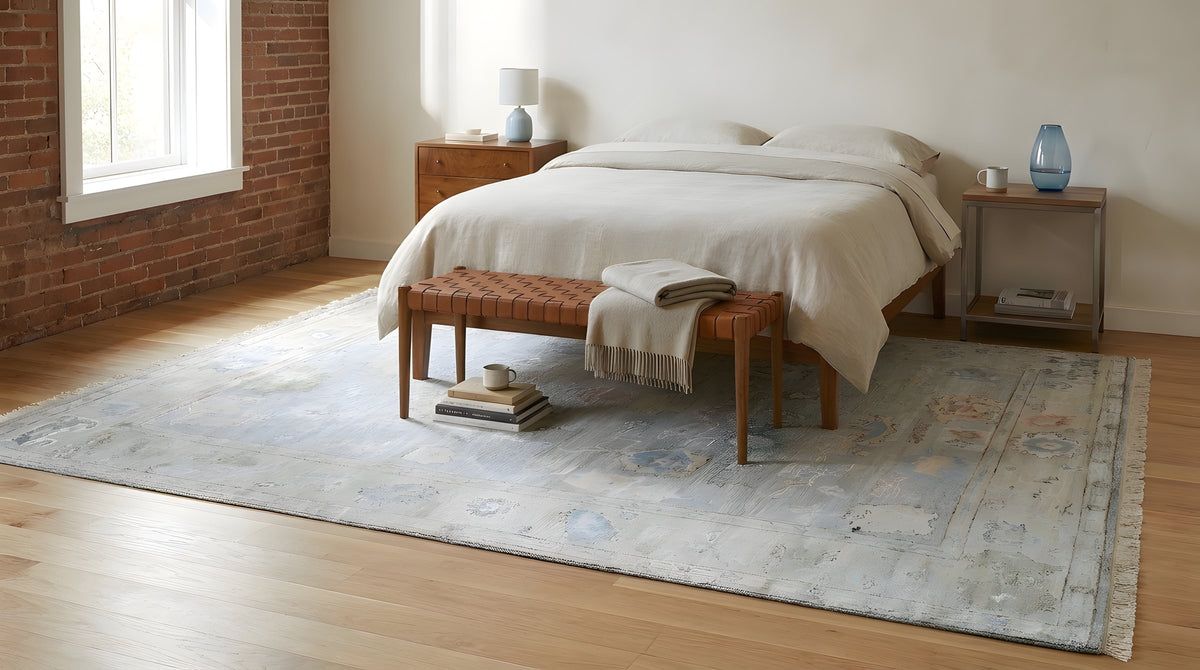 Nadia Harlow Gray and Ivory Hand Knotted Silk Rug in a bedroom