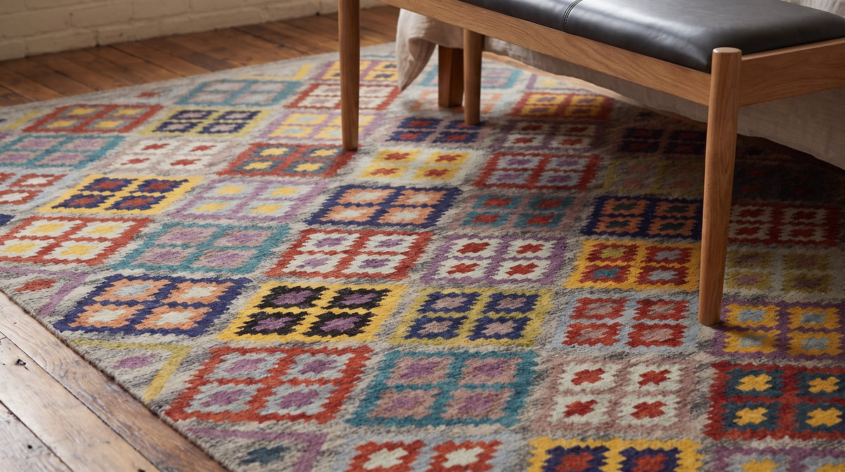 Nadia Kilim Multicolor Flatweave Wool Rug in a bedroom
