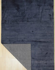 Navy blue solid handmade wool and viscose rug