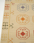 Corner detail of the OSK1IV beige reversible kilim wool rug showing the flat weave