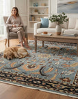 Gray and navy traditional hand-knotted wool rug KR110GY styled in a living room