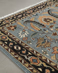 Gray and navy traditional hand-knotted wool rug KR110GY in a decorated room