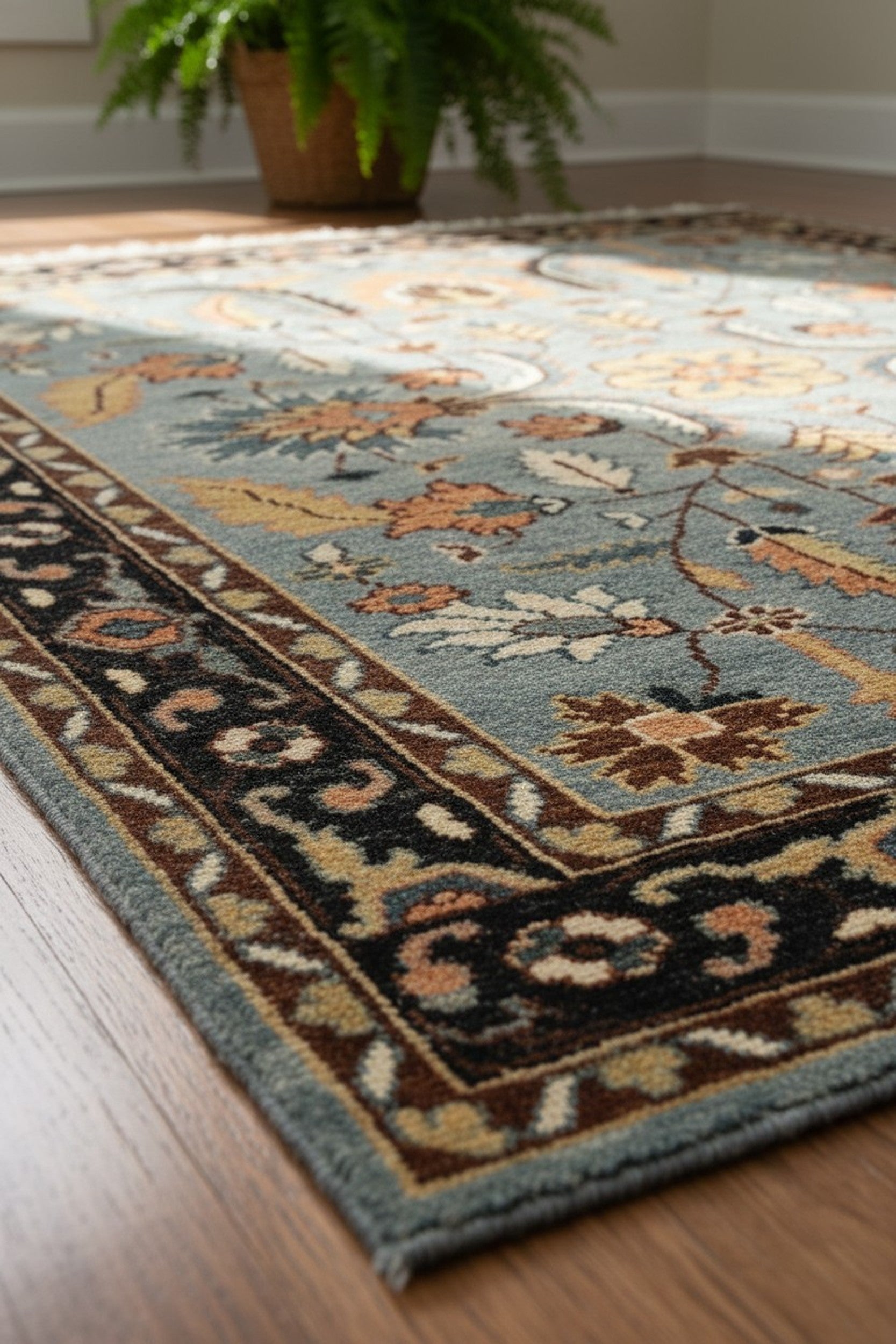 Gray and navy traditional hand-knotted wool rug KR110GY displayed in a room scene