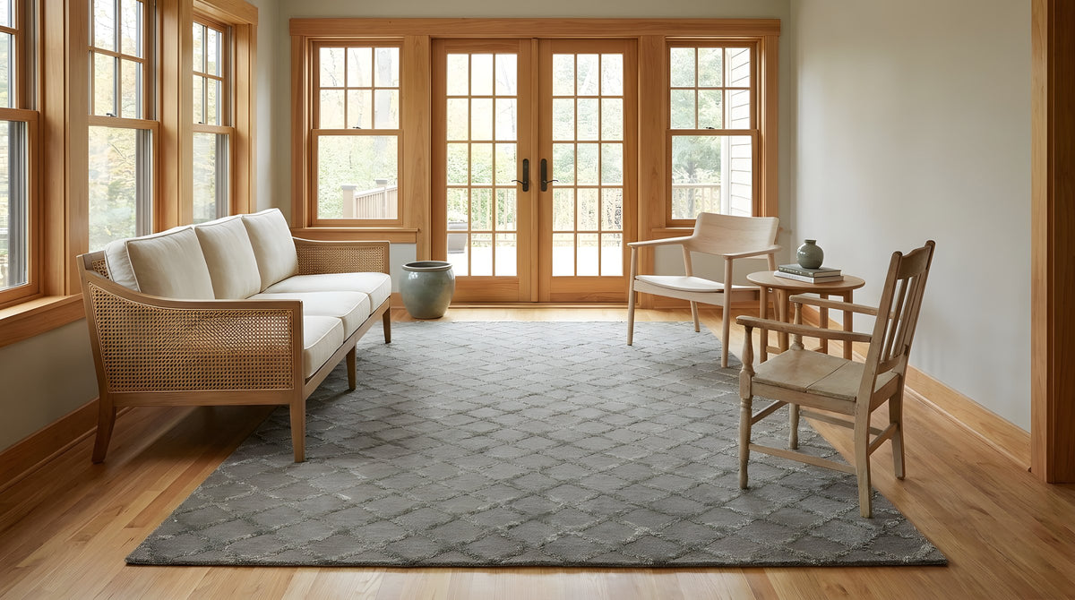 Nina Marrakesh Dark Gray Hand Knotted Wool & Viscose Rug in a sunroom