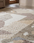Nina Oriental Multicolor Hand Knotted Wool Rug in a living room
