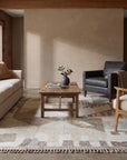 Nina Oriental Multicolor Hand Knotted Wool Rug in a living room