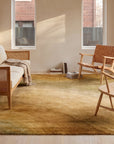 Nina Stylish Beige Hand Tufted Wool Rug in a sunroom