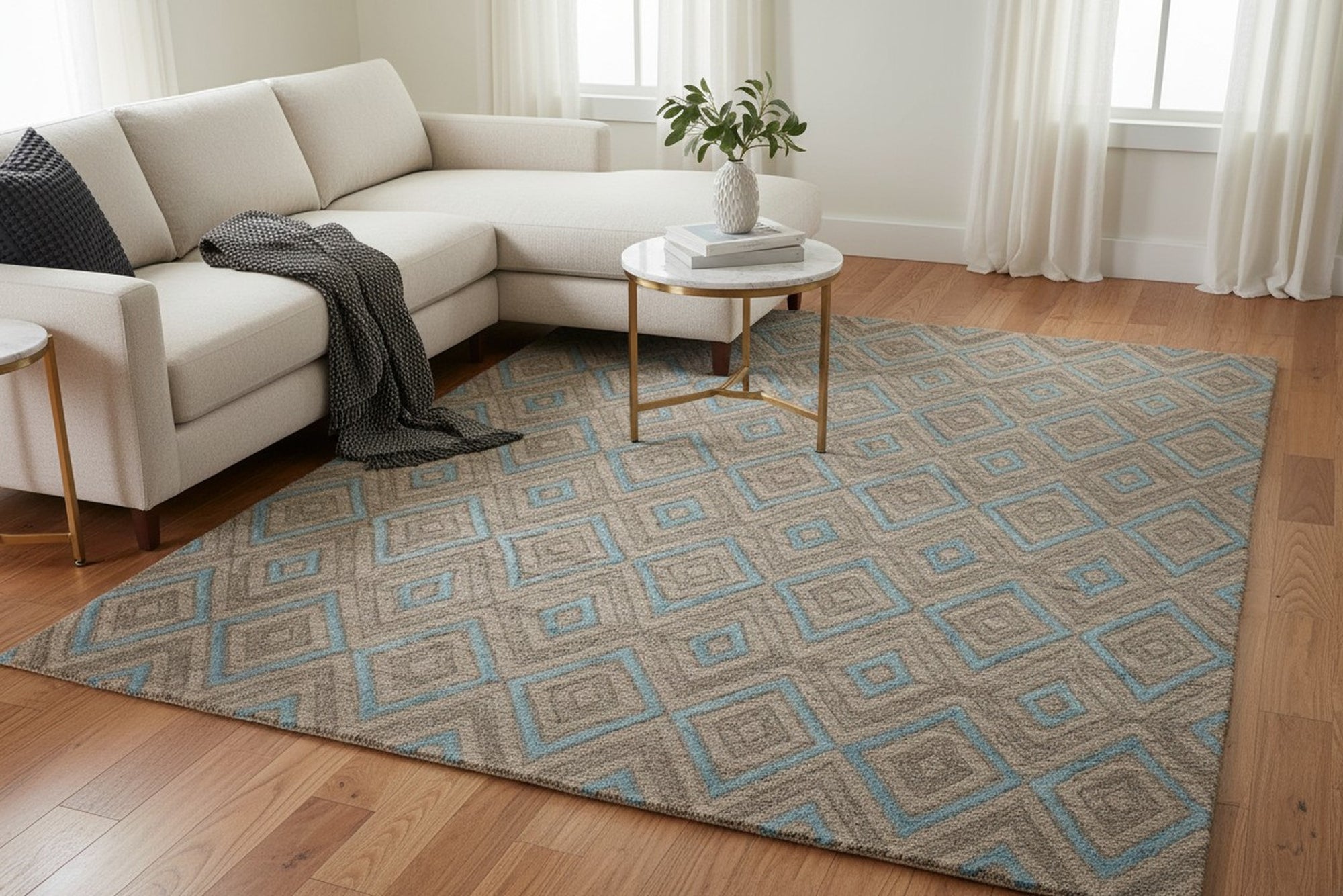 Gray transitional trellis handmade wool and viscose area rug styled in a living room