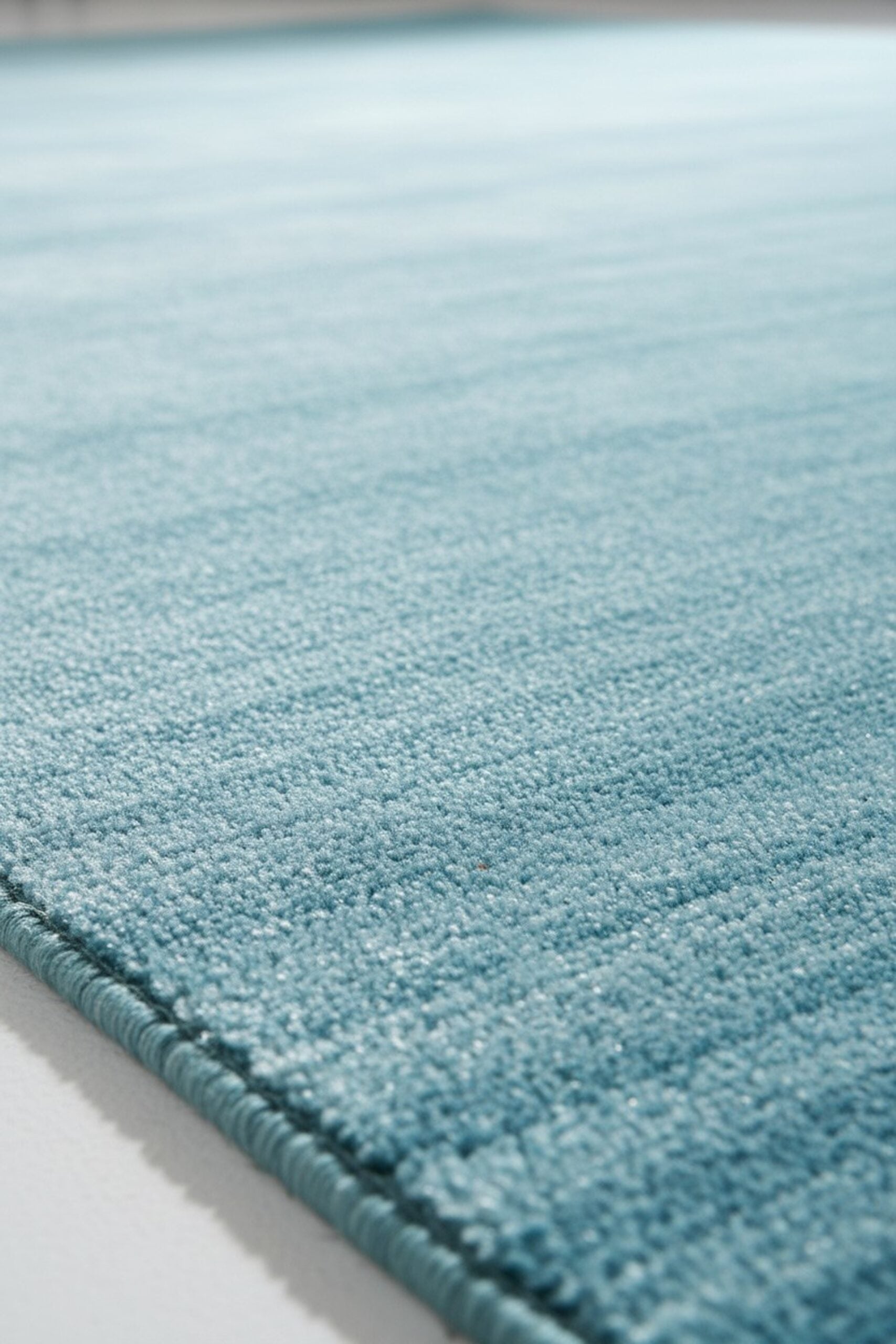 Blue contemporary solid handmade wool and viscose area rug