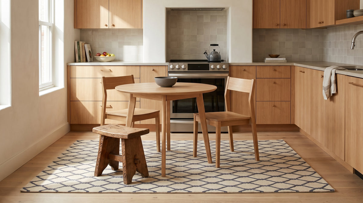 Ophelia Timeless Beige Hand Tufted Wool Rug in a kitchen
