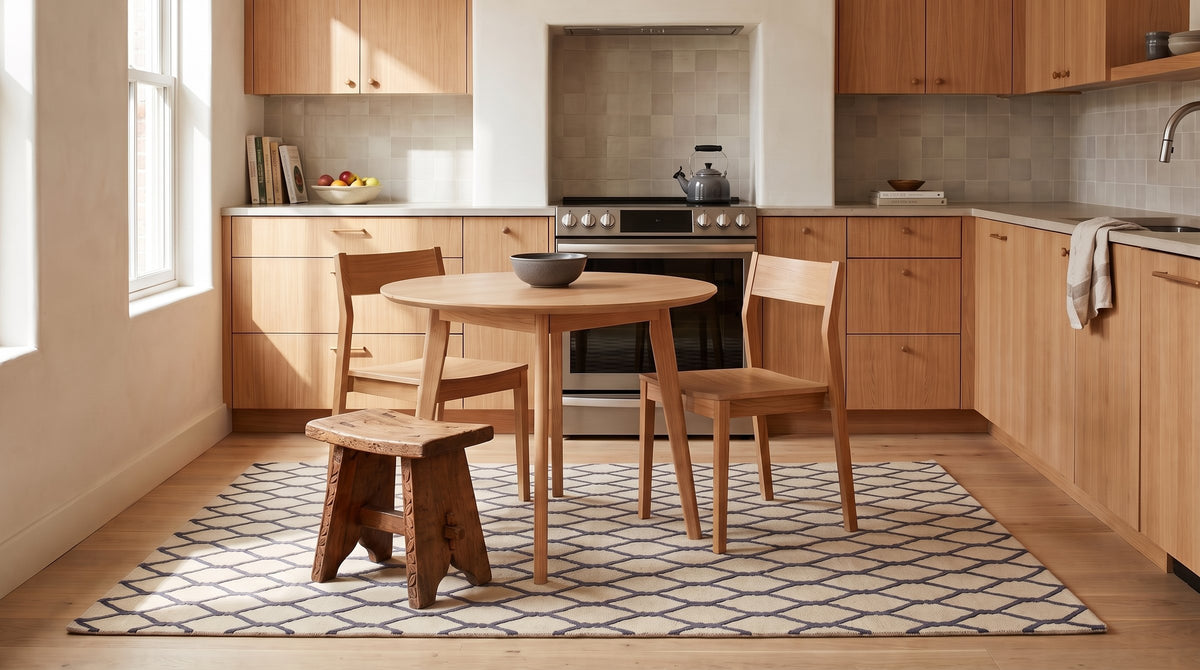 Ophelia Timeless Beige Hand Tufted Wool Rug in a kitchen