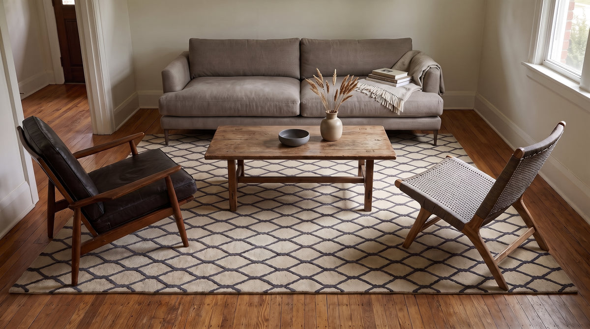Ophelia Timeless Beige Hand Tufted Wool Rug in a living room