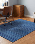 Para Penelope Blue Flatweave Wool Rug in a home office
