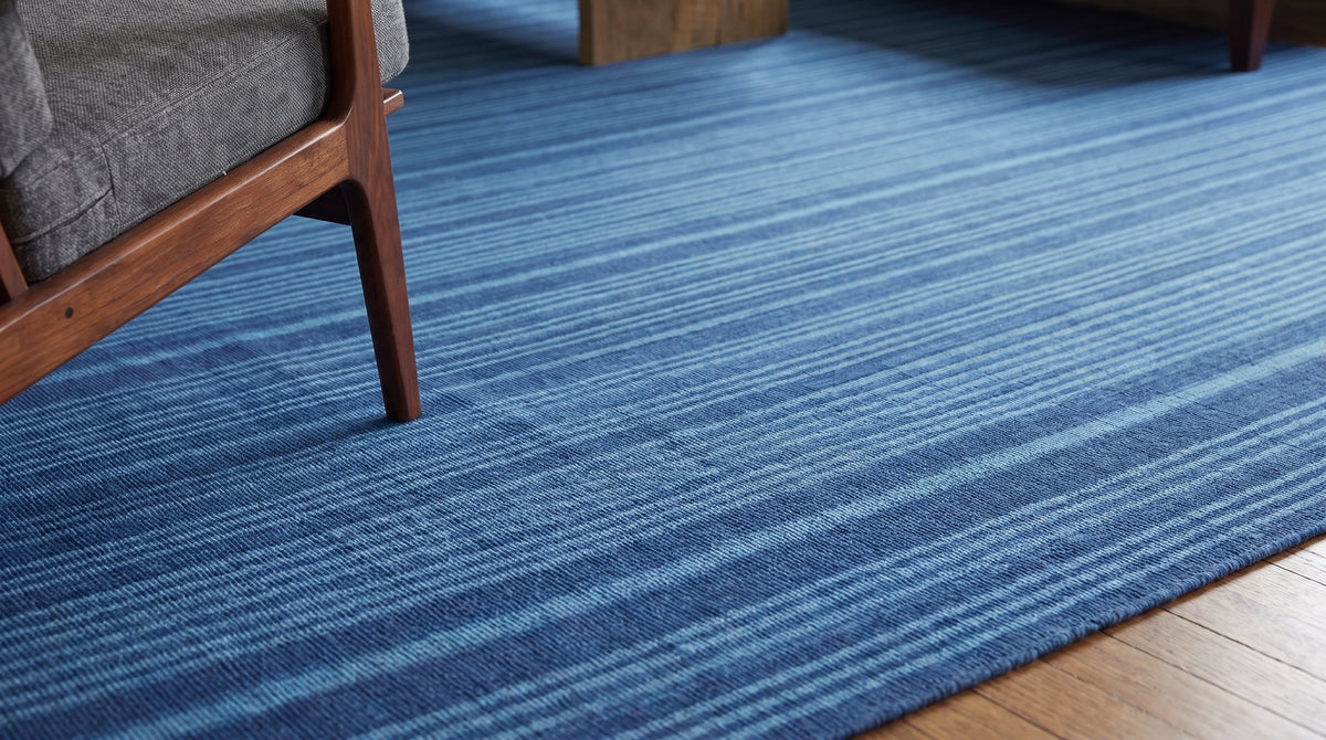 Para Penelope Blue Flatweave Wool Rug in a living room