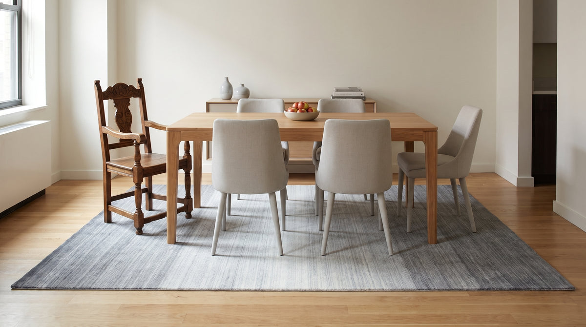 Penelope Nina Charcoal Handmade Wool Rug in a dining room