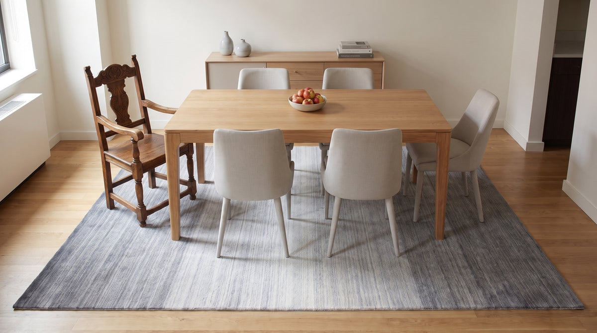Penelope Nina Charcoal Handmade Wool Rug in a dining room