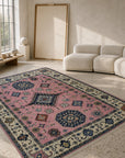 Pink and ivory Kazak rug in a living room