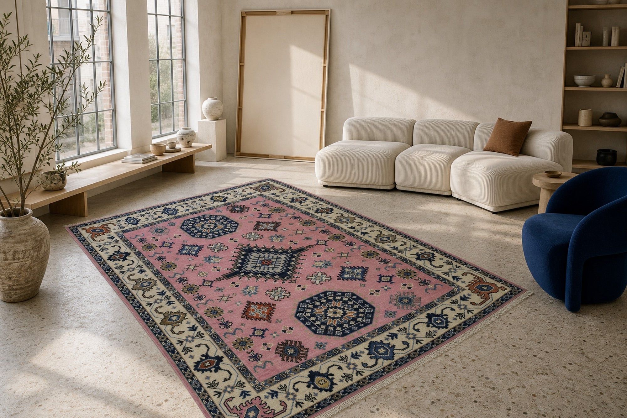 Pink ivory Kazak rug styled in a living room