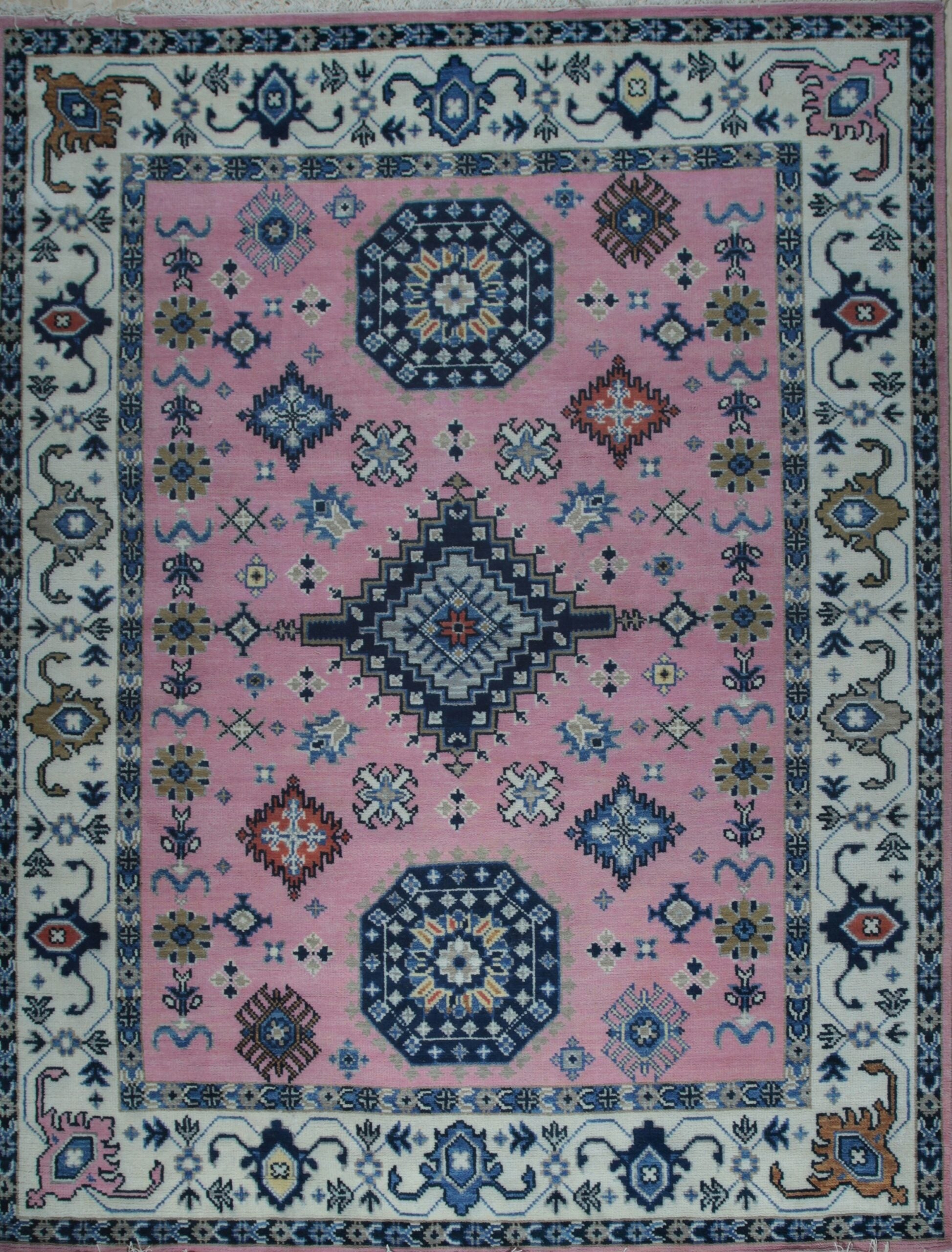 Pink and ivory traditional Kazak hand-knotted wool rug, full overhead view