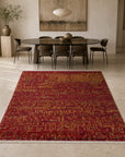Red sari-silk Anand rug in a gallery dining room