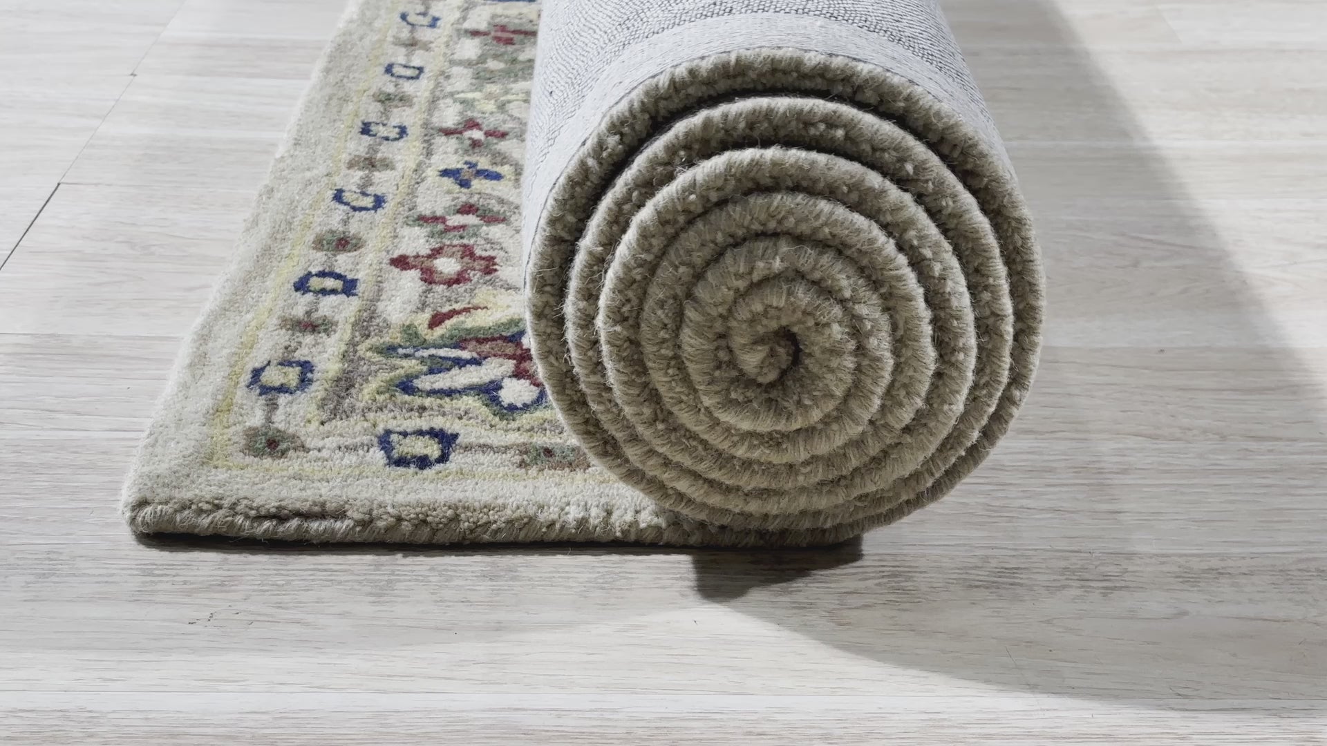 Graceful Exquisite Ivory Hand Tufted Wool Rug, a luxurious ivory wool rug with subtle textures, complements a modern living room setting, providing warmth and elegance underfoot.