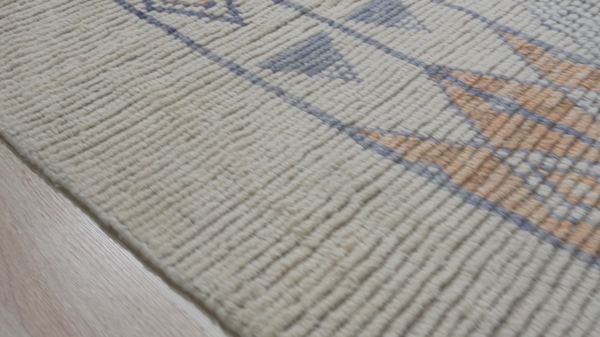 Vibrant Marrakech Multicolored Hand-Knotted Wool Rug, showcasing a lively pattern of vibrant colors and intricate knotwork, displayed in a home setting, adding warmth and character to the room.