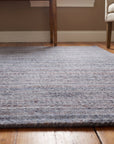 Radiant Chic Multicolor Handmade Wool Rug in a entryway